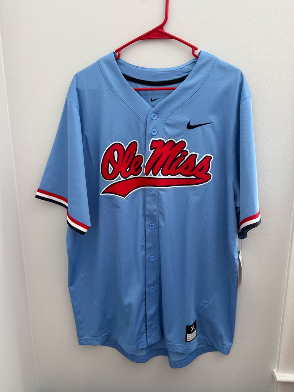 Nike Men's Ole Miss Sky Blue Baseball Jersey with Red Script